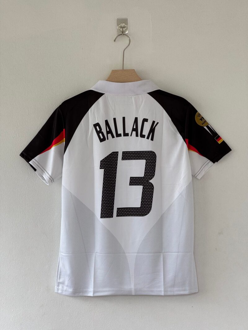 0A164706-B2E0-461B-A435-ED8A7019434D Leadership & Power – Germany 2004/05 Home Kit (Michael Ballack Edition)
