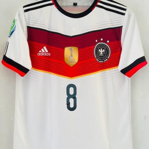 325FBD3D-1D9B-417A-ACFB-99D0B8A61D6C Relive World Cup Glory with the 2014-15 Germany Home Jersey – Mesut Özil Edition