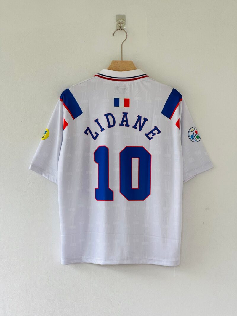 589F9C8C-DC4A-4F5B-A1D6-661BE861F532 Celebrate Zidane’s Brilliance with the 1996-97 France Away Jersey Five sleeve polo