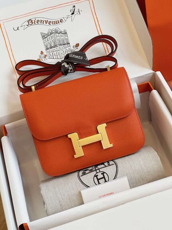 Tui-Hermes-Constance-Bag-Epsom-Gold-Mau-Cam-Sieu-Cap-19cm-1-600x800-1 Hermes Constance Bag Epsom Gold Orange Like Auth Handbags 19cm