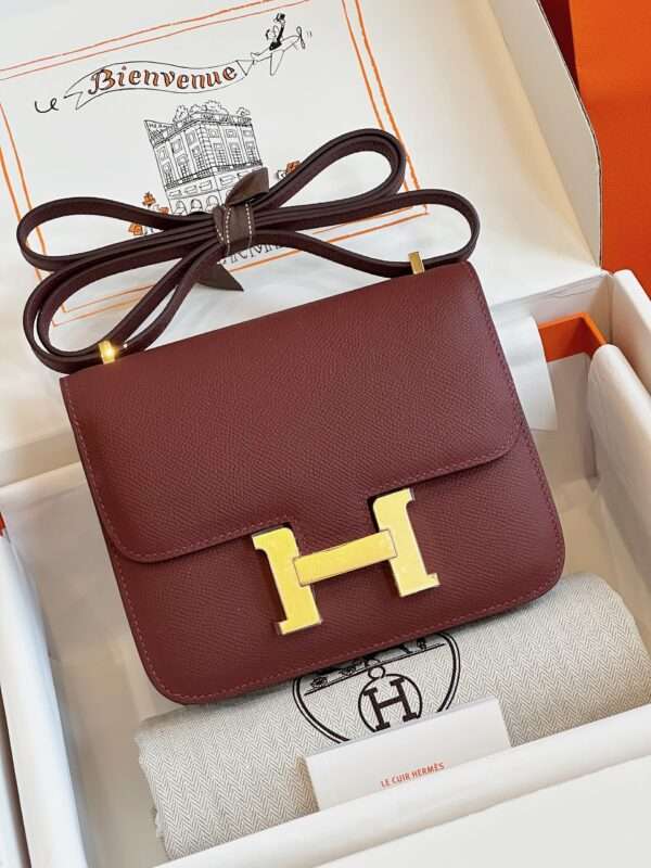 Tui-Hermes-Constance-Bag-Epsom-Gold-Mau-Do-Dun-Sieu-Cap-19cm-1-600x800-1 Hermes Constance Bag Epsom Gold Dark Red Handbags 19cm