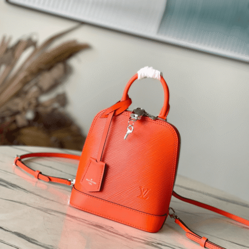 Untitled-design-2025-05-27T044241.219 Louis Vuitton LV Alma Like Auth Backpack Orange Lock Silver 15x20x10cm