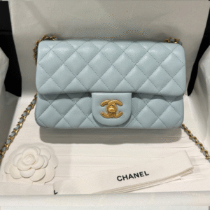 Untitled-design-2025-05-28T174245.330 Chanel Woc Charm Replica 11 Handbag Lizard Skin Black With Gold Lock 20cm
