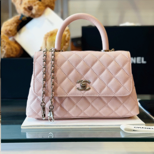 Untitled-design-2025-05-28T174908.466 Chanel Coco Handbags Leather Pink With Silver Lock 23cm
