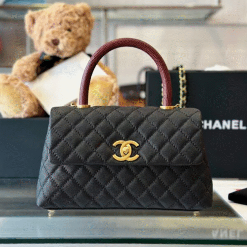 Untitled-design-2025-06-03T184542.499 Chanel Handbag Coco Lock Gold Lizard Skin Black 24cm