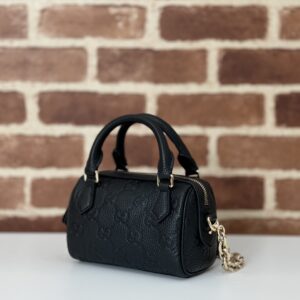 GUCCI GG Emblem medium boston bag in Black Leather