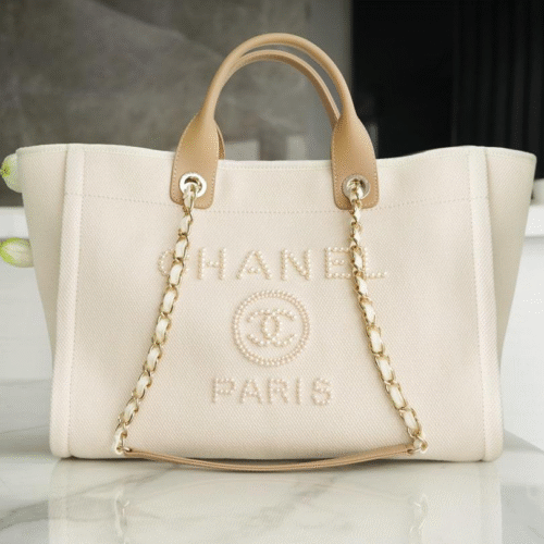 img_0141-1 CHANEL TOTE BAG 39 ATTACHED PEARL LOGO IN BEIGE CANVAS GOLD HARDWARE