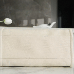 CHANEL TOTE BAG 39 ATTACHED PEARL LOGO IN BEIGE CANVAS GOLD HARDWARE