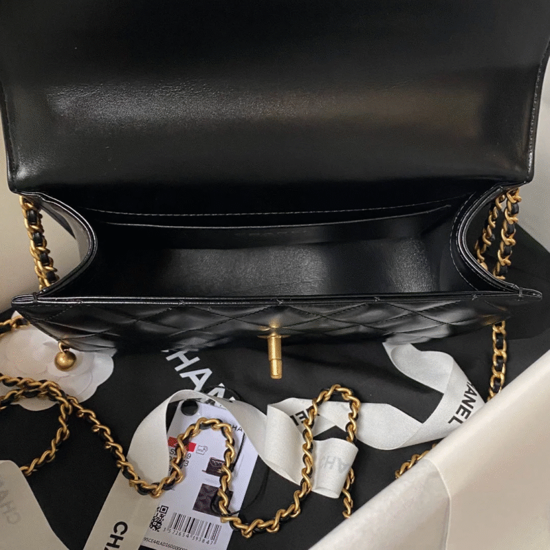 CHANEL FLAP BAG 22 IN BLACK CALFSKIN WITH DOUBLE GOLD BALL