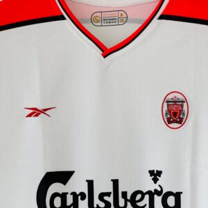 rn-image_picker_lib_temp_febe2ad0-af9b-4da3-95cb-2a1bf5f924d6 Celebrate Owen’s Explosive Brilliance with the 1998-99 Liverpool FC Away Jersey – Embroidery Edition